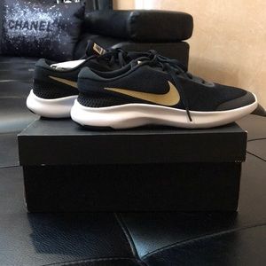 Brand New Never worn Black with Gold Nike Shoes